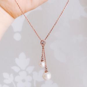 Stainless steel imitation pearl necklace in rosegold plating